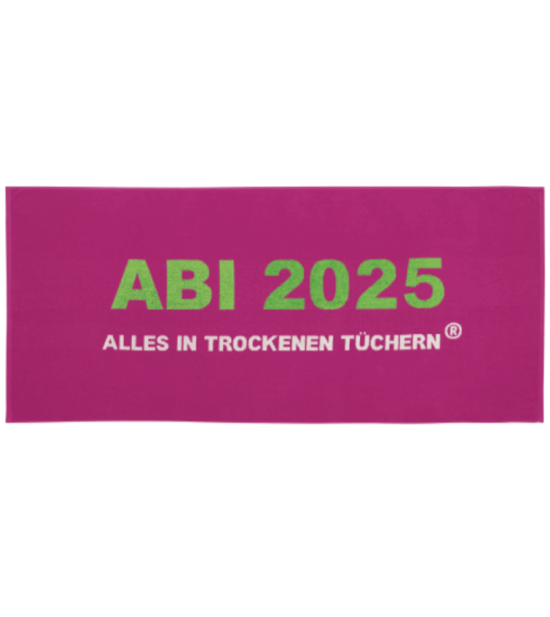 pinkes Handtuch auf weißem Hintergrund. In der Mitte steht in großen grünen Buchstaben „ABI 2025“. Darunter befindet sich in weißen Großbuchstaben die Aufschrift „ALLES IN TROCKENEN TÜCHERN“.